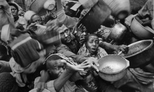 Starving people clamoring for food