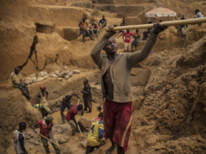 enslaved laborers in an open pit mine